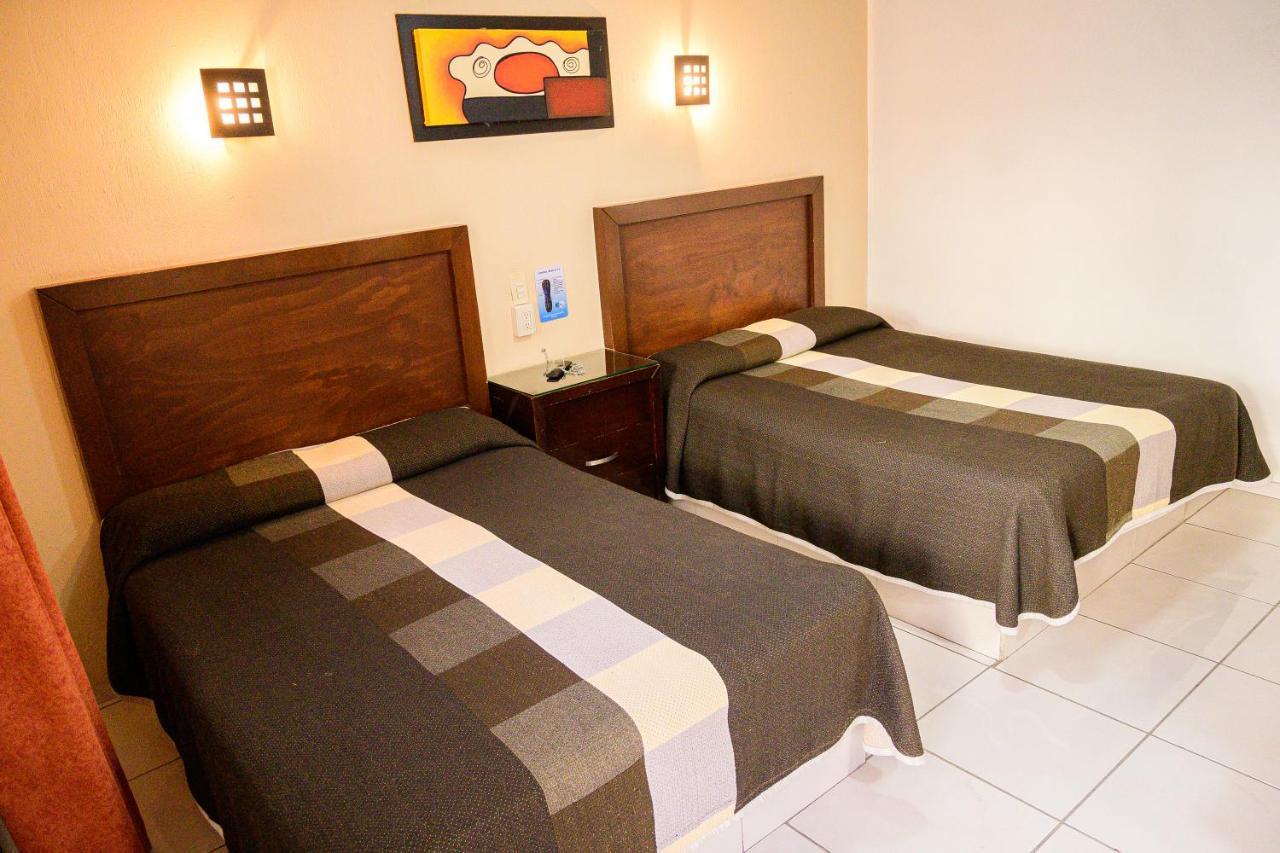 Hotel Acuario En Ocotlan Bagian luar foto