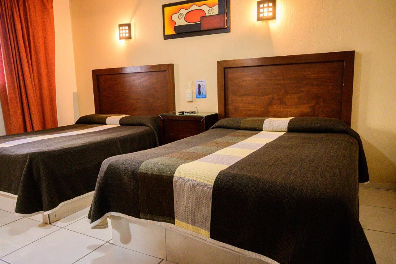 Hotel Acuario En Ocotlan Bagian luar foto