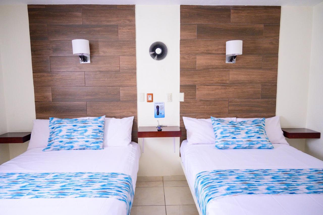 Hotel Acuario En Ocotlan Bagian luar foto