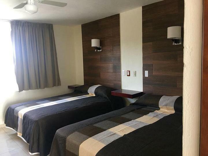 Hotel Acuario En Ocotlan Bagian luar foto